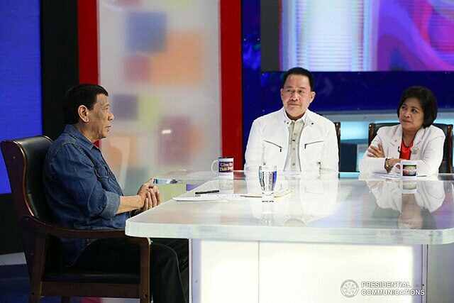 President Rodrigo Roa Duterte discusses matters during his guesting in the show "Give Us This Day" hosted by Kingdom of Jesus Christ founder and lead pastor, Apollo C. Quiboloy, at the Sonshine Media Network International (SMNI) Studio in Davao City on June 7, 2019. ALBERT ALCAIN/PRESIDENTIAL PHOTO